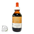 A 100ml glass bottle of Tick & Flea Prevention remedy for pets with a dropper, labeled with the brand Pure Animal Wellness.